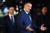 (FILES) Bosnian Serb leader Milorad Dodik (C) delivers a speech flanked by Serbia's President, in Banja Luka, northern Bosnia and Herzegovina, on February 26, 2025, following Milorad Dodik's one year prison sentence. Bosnia's prosecutors on March 12, 2025 ordered federal police to bring in ethnic Serb leader Milorad Dodik for questioning as part of an investigation into his alleged flouting of the country's constitution. (Photo by STRINGER / AFP)