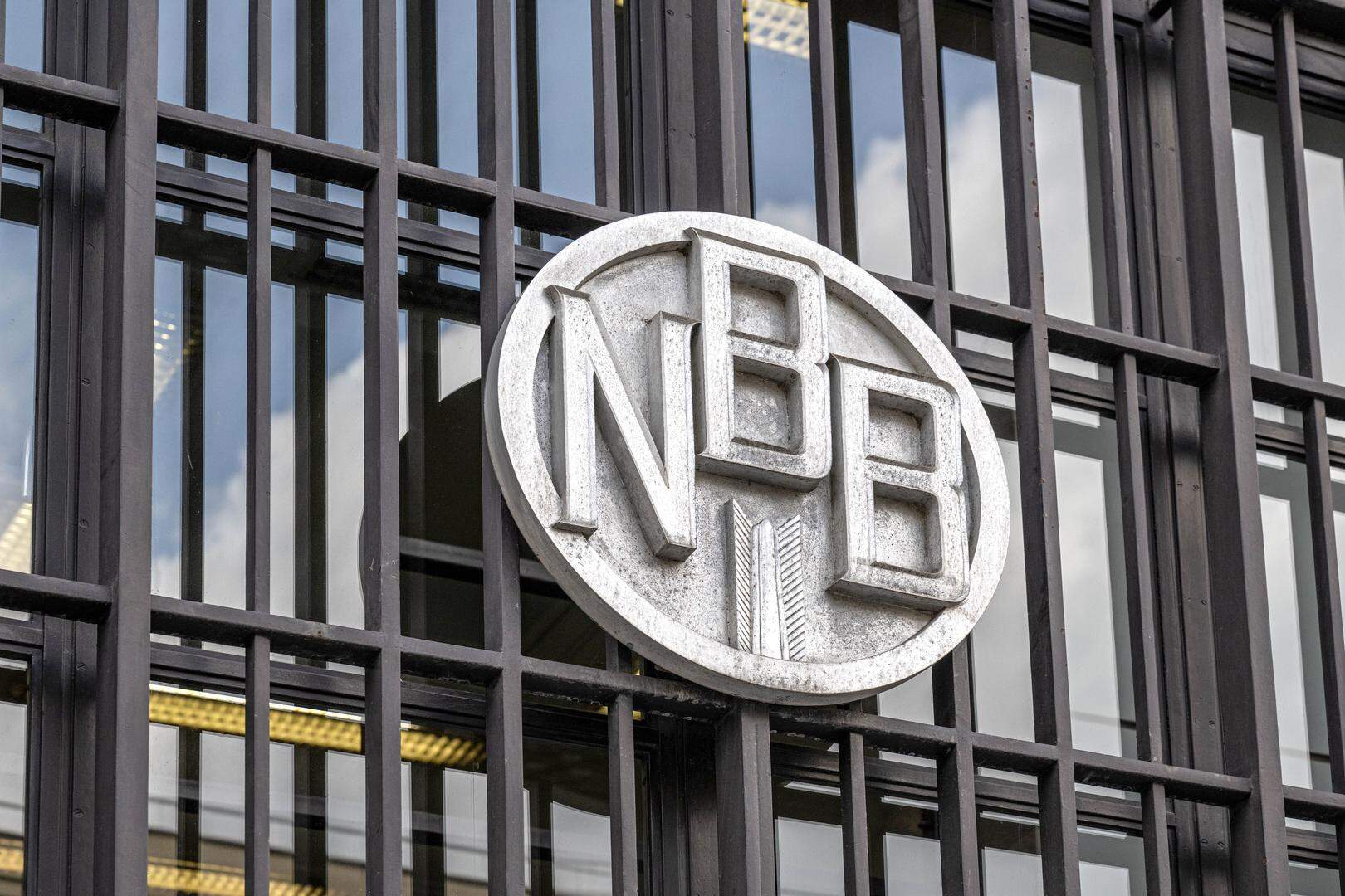 A logo of the National Bank is seen ahead of a meeting between representatives of political parties N-VA, Vooruit, CD&V, MR and Les Engages, to discuss a possible coalition for the Federal Government, at the National Bank in Brussels on Monday 01 July 2024. N-VA chairman De Wever, who was appointed 'informator' following June 9th elections, is testing the waters for a possible 'Arizona' coalition between the five parties. BELGA PHOTO JONAS ROOSENS