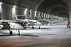 (FILES) This file handout picture provided by the Iranian Army on May 28, 2022, reportedly shows military unmanned aerial vehicles (UAVs or drones) at an underground base in an undisclosed location in Iran. - Iran is planning to supply hundreds of drones with combat weapon capabilities to Russia for use in Ukraine, a top US official said on July 11, 2022. Jake Sullivan, the White House national security advisor, said the information received by the United States supported views that the Russian military is facing challenges sustaining its weaponry after significant losses in Ukraine. (Photo by Iranian Army office / AFP) / RESTRICTED TO EDITORIAL USE - MANDATORY CREDIT "AFP PHOTO / IRANIAN ARMY - NO MARKETING - NO ADVERTISING CAMPAIGNS - DISTRIBUTED AS A SERVICE TO CLIENTS