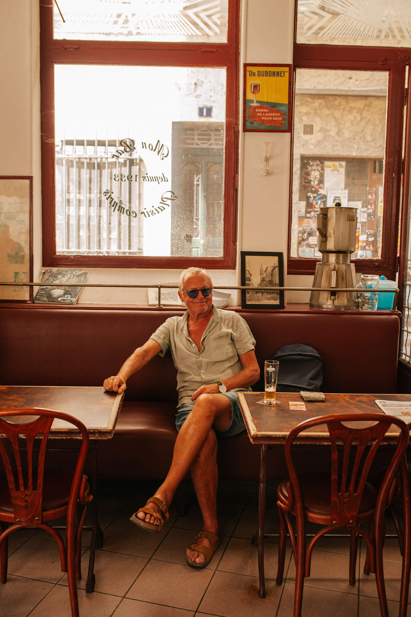 A Belgian customer sits inside Mon Bar in Avignon in Vaucluse in Provence in France on July 30, 2026. The scene suggests that the establishment has become a favorite place for visitors seeking the authentic atmosphere of the neighborhood.
Un client belge est assis a Mon Bar a Avignon dans le Vaucluse en Provence en France le 30 Juillet 2026. La scene suggere que letablissement est devenu un lieu de predilection pour les visiteurs en quete de l atmosphere authentique du quartier.