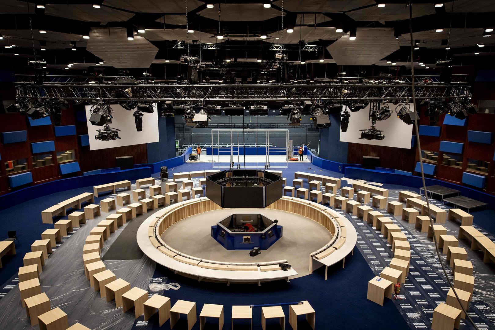 Workers prepare the main meeting room ahead of the forthcoming NATO summit in The Hague on May 22, 2025, which is scheduled to take place June 24-25. (Photo by Koen van Weel / ANP / AFP) / Netherlands OUT