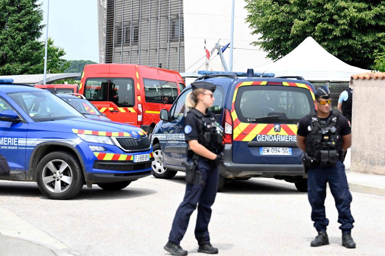 French gendarmes control the access to a secondary school after a 31-year-old teaching assistant was stabbed with a knife by a 15-year-old pupil during a bag search in Nogent, eastern France, on June 10, 2025. The teaching assistant, who died of her wounds, received several knife wounds just as classes were starting, and the alleged attacker, who was overpowered by gendarmes, "appears to be a student at the school," education officials said. (Photo by Jean-Christophe VERHAEGEN / AFP)