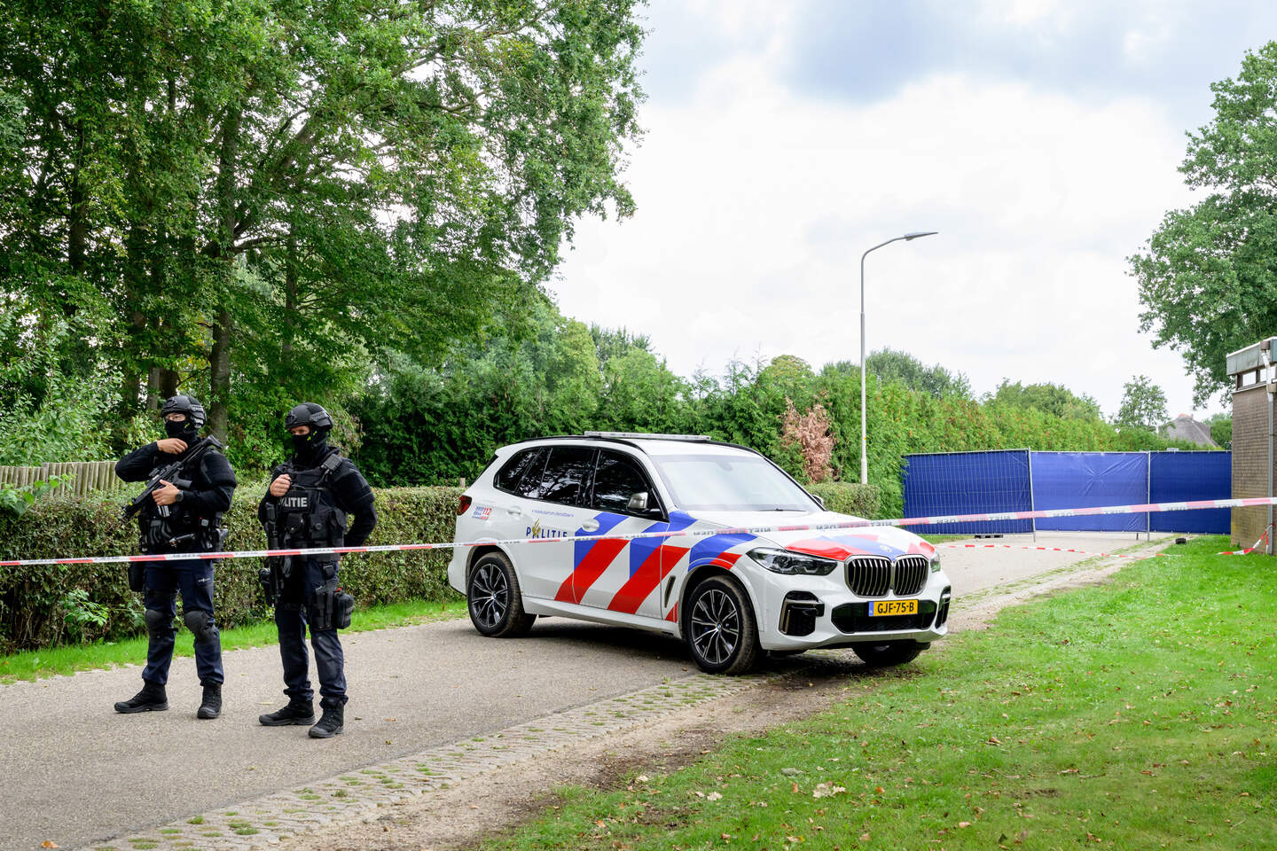 Police identify 2 gunmen among 32 held over Overasselt killing