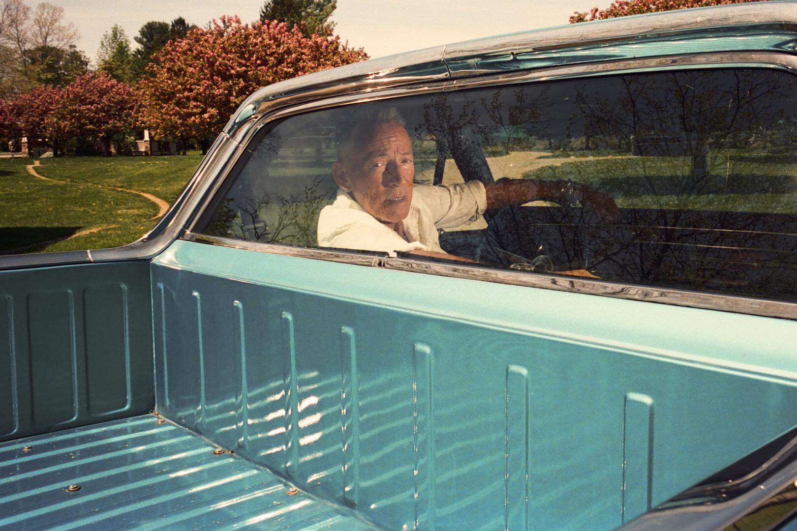 Bruce Springsteen driving near his childhood home in Freehold, N.J., in June 2025. Springsteen is unveiling a huge, almost entirely unknown trove of songs from his past on ÒTracks II: The Lost Albums.Ó (Daniel Arnold/The New York Times)