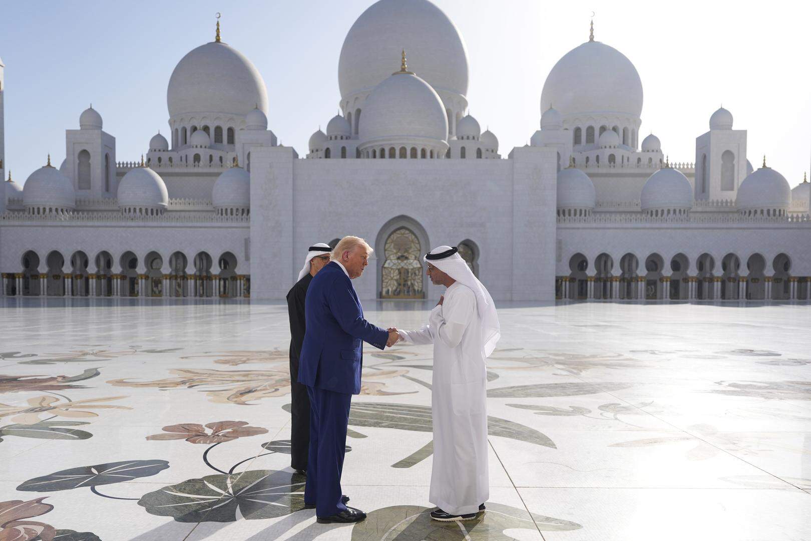 President Donald Trump and UAE President Mohammed bin Zayed Al Nahyan, left, tour the Sheikh Zayed Grand Mosque, Thursday, May 15, 2025, in Abu Dhabi, United Arab Emirates. (AP Photo/Alex Brandon)