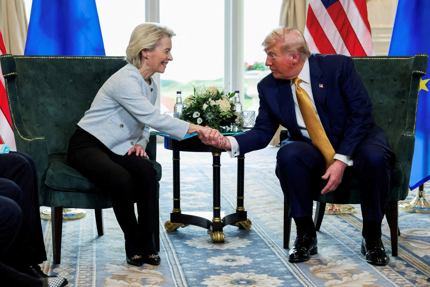 FILE PHOTO: U.S. President Donald Trump shakes hands with European Commission President Ursula von der Leyen, in Turnberry, Scotland, Britain, July 27, 2025. REUTERS/Evelyn Hockstein/File Photo