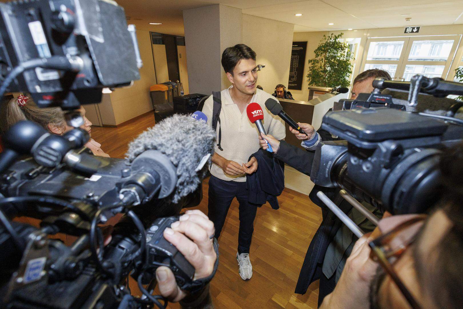 Vooruit's Conner Rousseau talks to the press as he arrives for a party bureau of Flemish socialist party Vooruit, Monday 10 June 2024 in Brussels, after yesterday's regional, federal and European elections. BELGA PHOTO NICOLAS MAETERLINCK